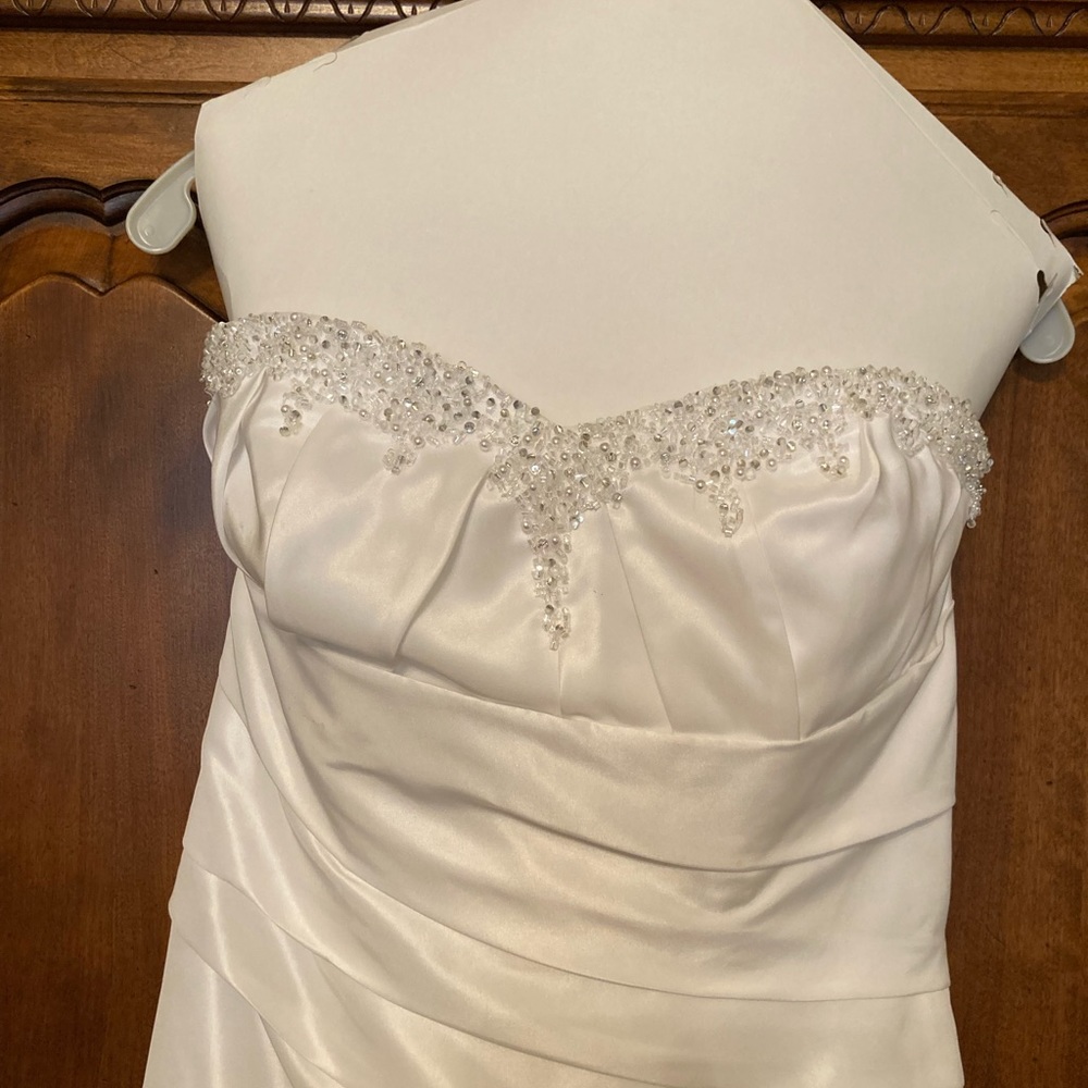Beautiful David’s bridal wedding dress and shoes.